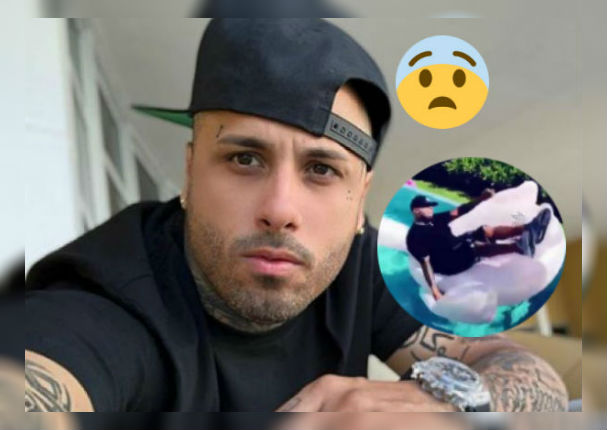 Nicky Jam sufre pequeño incidente durante sesión de fotos en piscina (VIDEO)